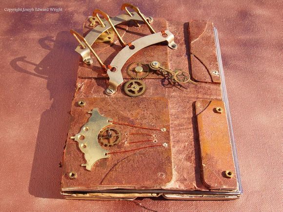 steampunk book with clock gear on top