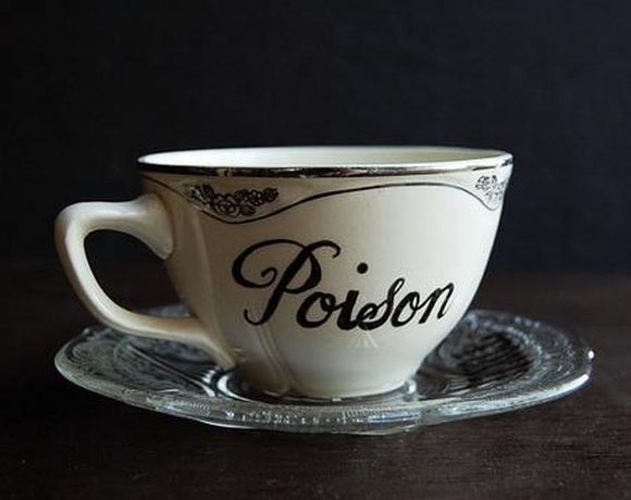 poison writen on tea cup