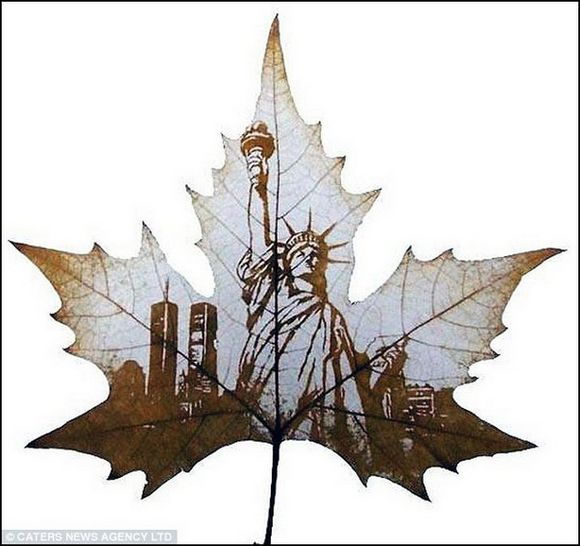 statue of liberty carved on a leaf