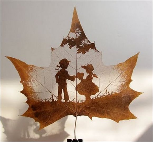 love sharing between two kids carved on leaf