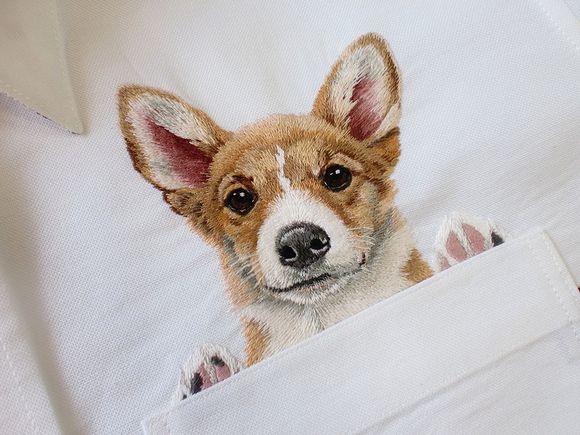 embroidery, dog peeking out of pocket