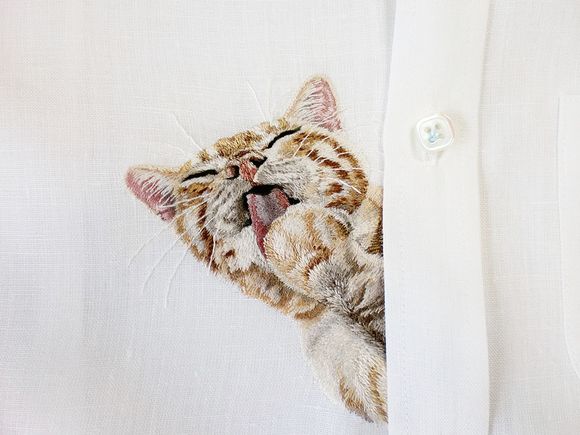 embroidered cats on clothes 